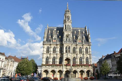 a large building with a tower on top of it at "Ter Ename n°2" in Oudenaarde