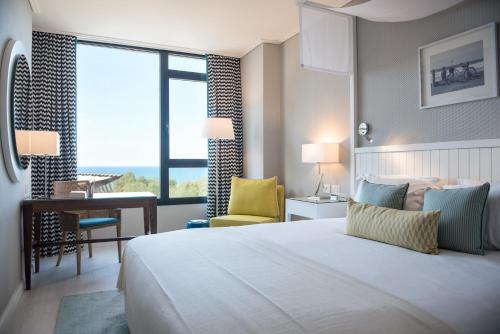 Postel nebo postele na pokoji v ubytování Melody Hotel - an Atlas Boutique Hotel