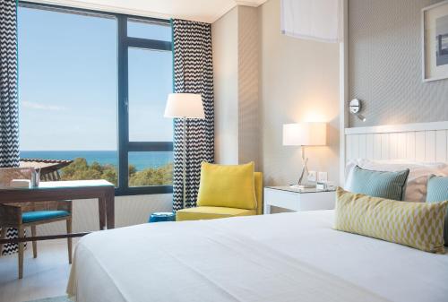 Katil atau katil-katil dalam bilik di Melody Hotel - an Atlas Boutique Hotel