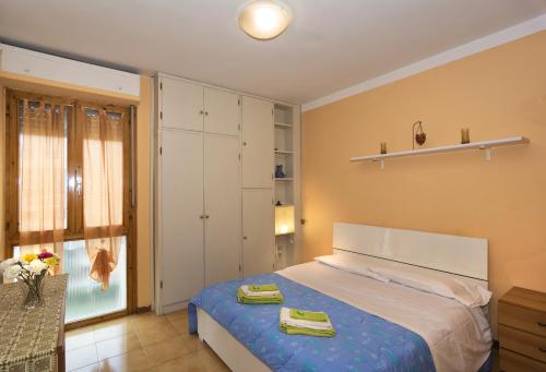 Cama o camas de una habitación en Cisanello Appartamenti Teresa