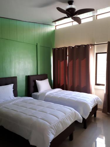 Een bed of bedden in een kamer bij Chalet San Juanillo