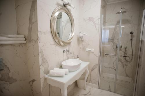 Ванна кімната в Pokoje Amore Residence