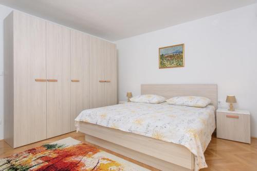 Posteľ alebo postele v izbe v ubytovaní Apartment Kate