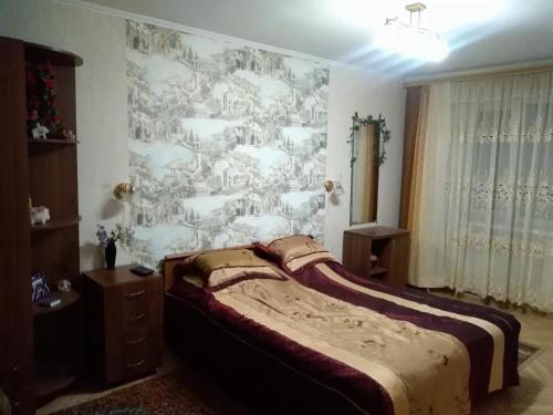 Katil atau katil-katil dalam bilik di Apartment on Kuybysheva 59