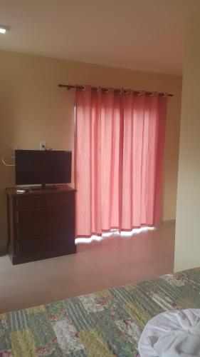 Katil atau katil-katil dalam bilik di Pousada Viva Mar