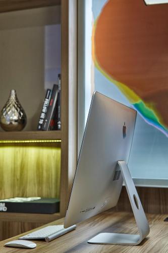 an apple computer sitting on top of a desk at Radisson Rio de Janeiro Barra in Rio de Janeiro