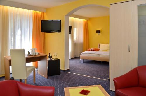 Ein Bett oder Betten in einem Zimmer der Unterkunft Hotel Heissinger