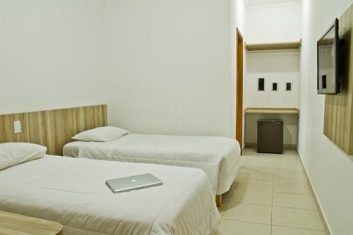 Katil atau katil-katil dalam bilik di Eden Park Hotel
