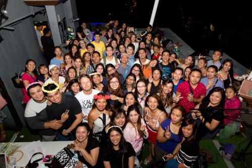 a large group of people posing for a picture at Z Hostel in Manila