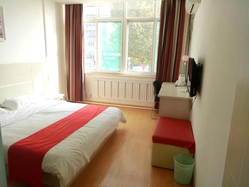 Ένα ή περισσότερα κρεβάτια σε δωμάτιο στο Thank Inn Chain Hotel Shandong Zichuan Songlin West Road