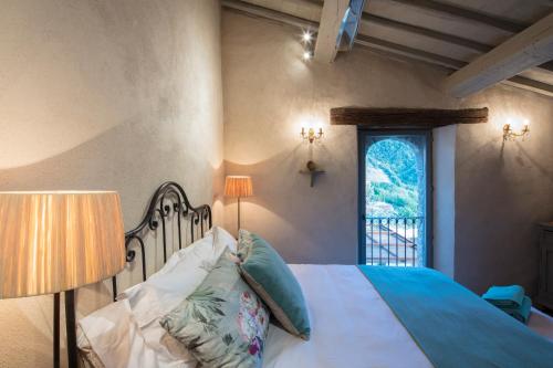 מיטה או מיטות בחדר ב-Casa di Led