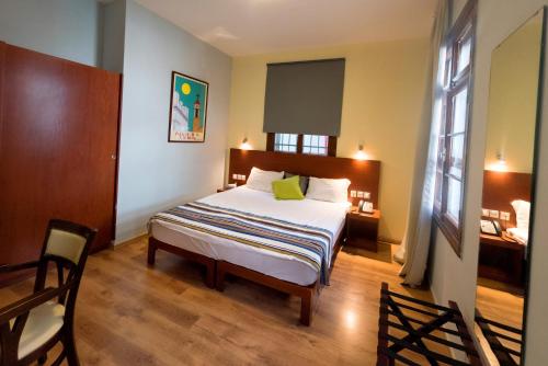 Postel nebo postele na pokoji v ubytování Villa Nazareth B&B