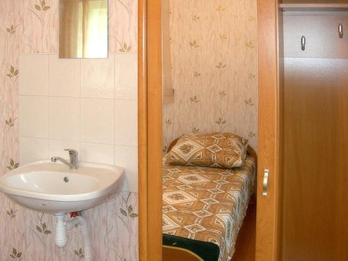 a bathroom with a sink and a sink at Albatross in Kaunata