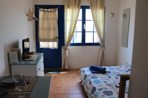 Ένα ή περισσότερα κρεβάτια σε δωμάτιο στο Casita del Rio 2