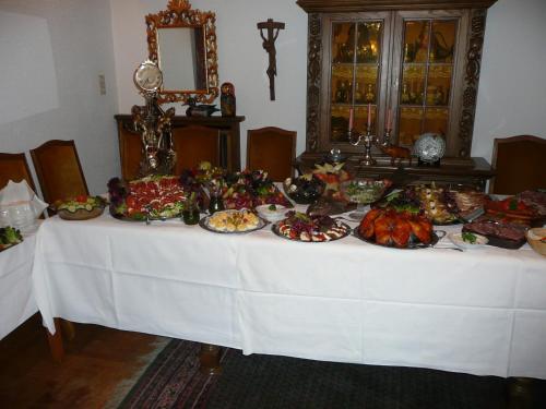 a table with many plates of food on it at Resengörg in Ebermannstadt