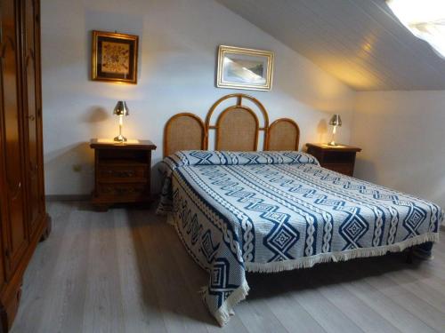 Un pat sau paturi într-o cameră la Villa Giove