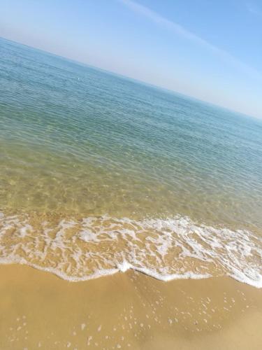 a view of the ocean from the beach at Palmera El Sokhna Chalets Families Only in Ain Sokhna