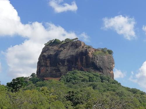 a large rock formation on top of a mountain at Mahi Villa in Bentota