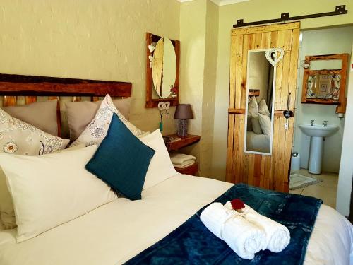 Cama o camas de una habitación en Thaba Lapeng Mountain Escape