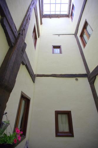 a view from the inside of a building with windows at Hostal Rural Elosta in Lekunberri
