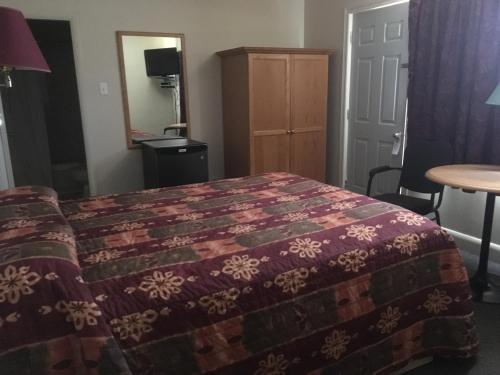 Krevet ili kreveti u jedinici u okviru objekta Fundy Spray Motel
