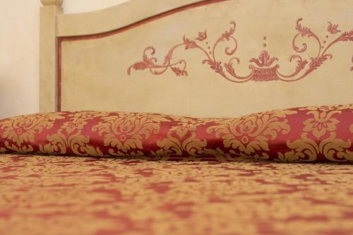 Una cama o camas en una habitación de Hotel Adda