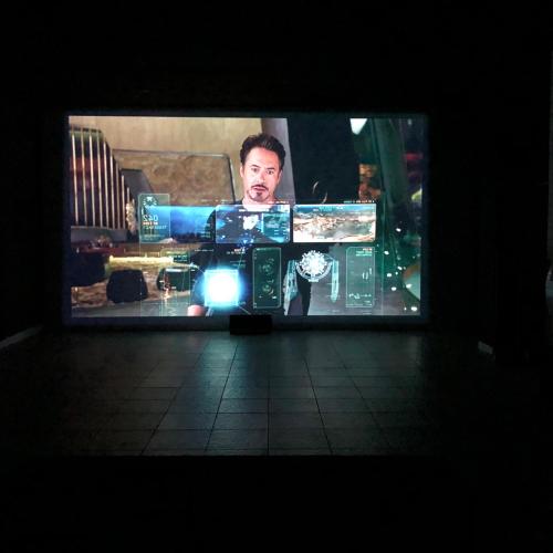 a television screen with a man in a room at Agriturismo Villa Gaia in Lonato del Garda