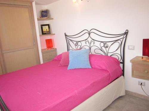 Ein Bett oder Betten in einem Zimmer der Unterkunft L'ANGOLO DEI ROMANTICI