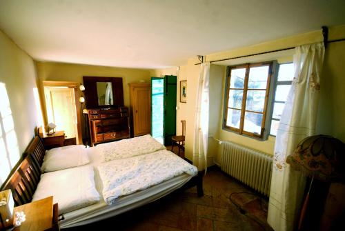 A bed or beds in a room at Villa La Canonica