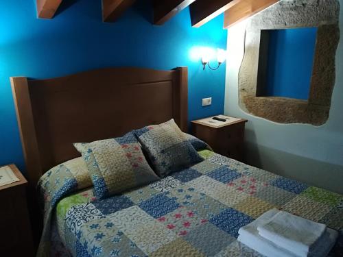 Postel nebo postele na pokoji v ubytování Casa La Pumarada