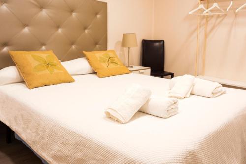 A bed or beds in a room at Madala XXI