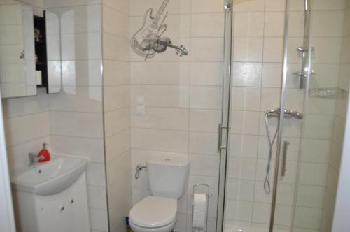Ένα μπάνιο στο Apartament Centrum Jurowiecka