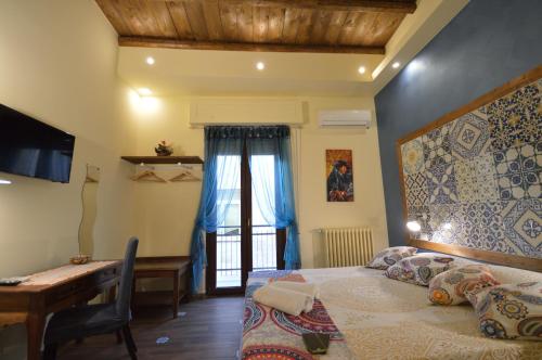 Letto o letti in una camera di Centro Sicilia Rooms-Suites & Terrace