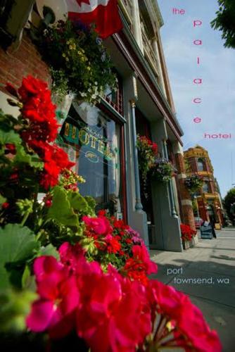 a bunch of flowers in front of a store at The Palace Hotel in Port Townsend