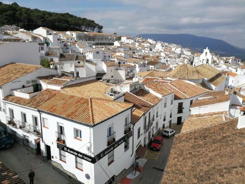 an aerial view of a town with white buildings at El Duende del Tejar in El Gastor