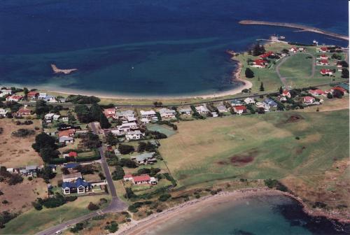 an aerial view of a small island in the water at LOW HEAD beachside bungalow "Cockle Shell" in Low Head