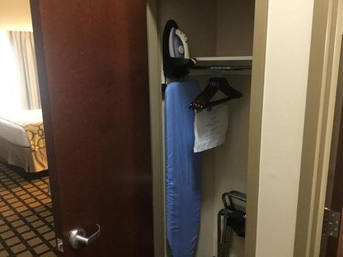 a bathroom with a blue towel hanging from the wall at Baymont by Wyndham Page Lake Powell in Page