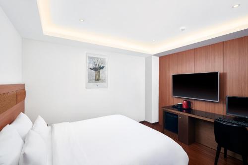 TV a/nebo společenská místnost v ubytování Lion Hotel