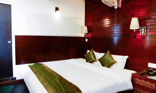 Cama o camas de una habitación en The Nettle and Fern Hotel Gangtok