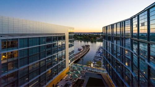 an aerial view of a building and a river at Hyatt House Washington DC/The Wharf in Washington