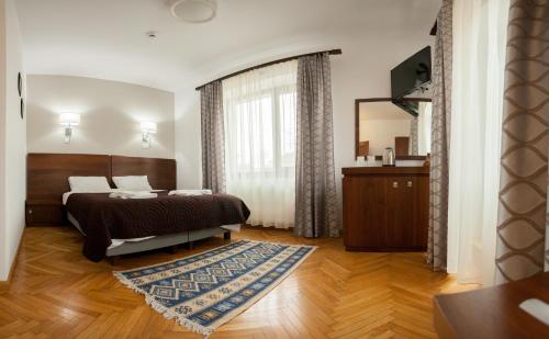 מיטה או מיטות בחדר ב-Matia Resort