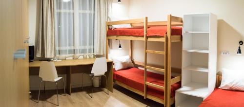 Ένα ή περισσότερα κρεβάτια σε δωμάτιο στο Fidelitas Hotel