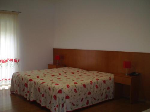 Postel nebo postele na pokoji v ubytování Hotel Serafim