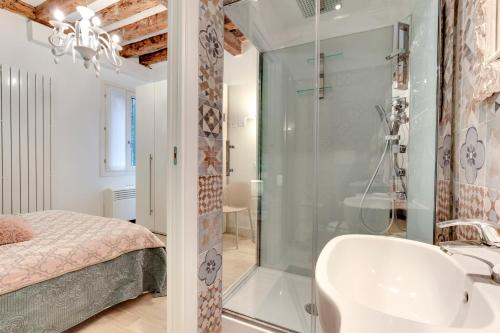 a bathroom with a shower and a sink at Rialto Prestige - Campo S Maria Formosa by Wonderful Italy in Venice