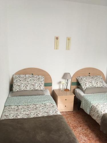 Posteľ alebo postele v izbe v ubytovaní Casa Verano
