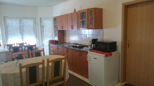 Η κουζίνα ή μικρή κουζίνα στο Natalie Appartment