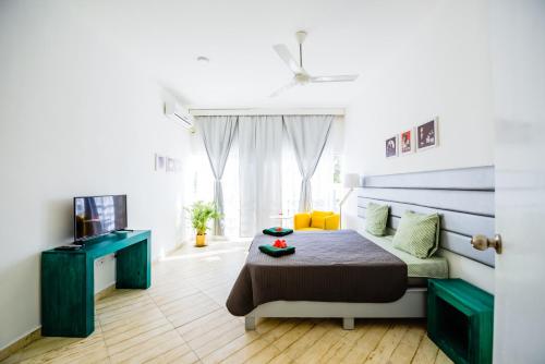 Postel nebo postele na pokoji v ubytování Terraza Art Villa Dominicana