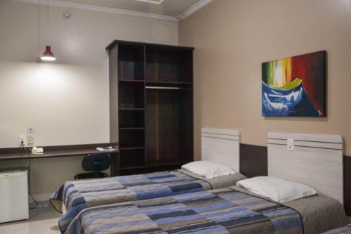 Katil atau katil-katil dalam bilik di Hotel Almanara