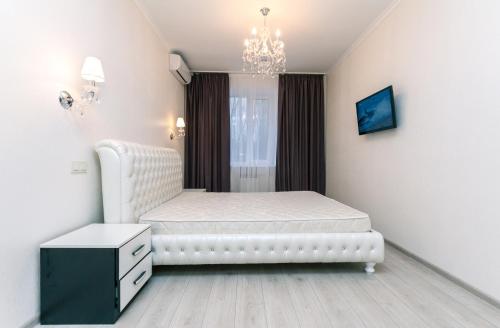 Cama o camas de una habitación en LuxCenterApartment