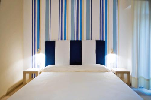 Art&Park Hotel Union Lidoにあるベッド